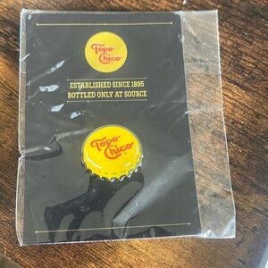Topo Chico hat lapel pin